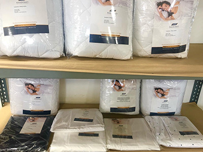 mattress-pads-on-shelf